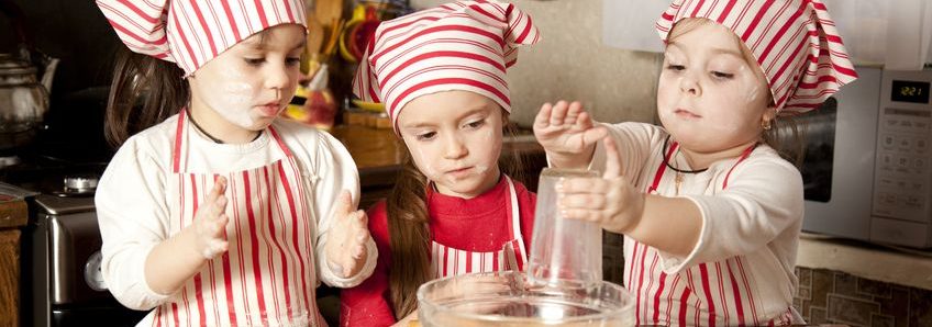 three little chefs enjoying in the kitchen making big mess little girls making bread in the kitchen